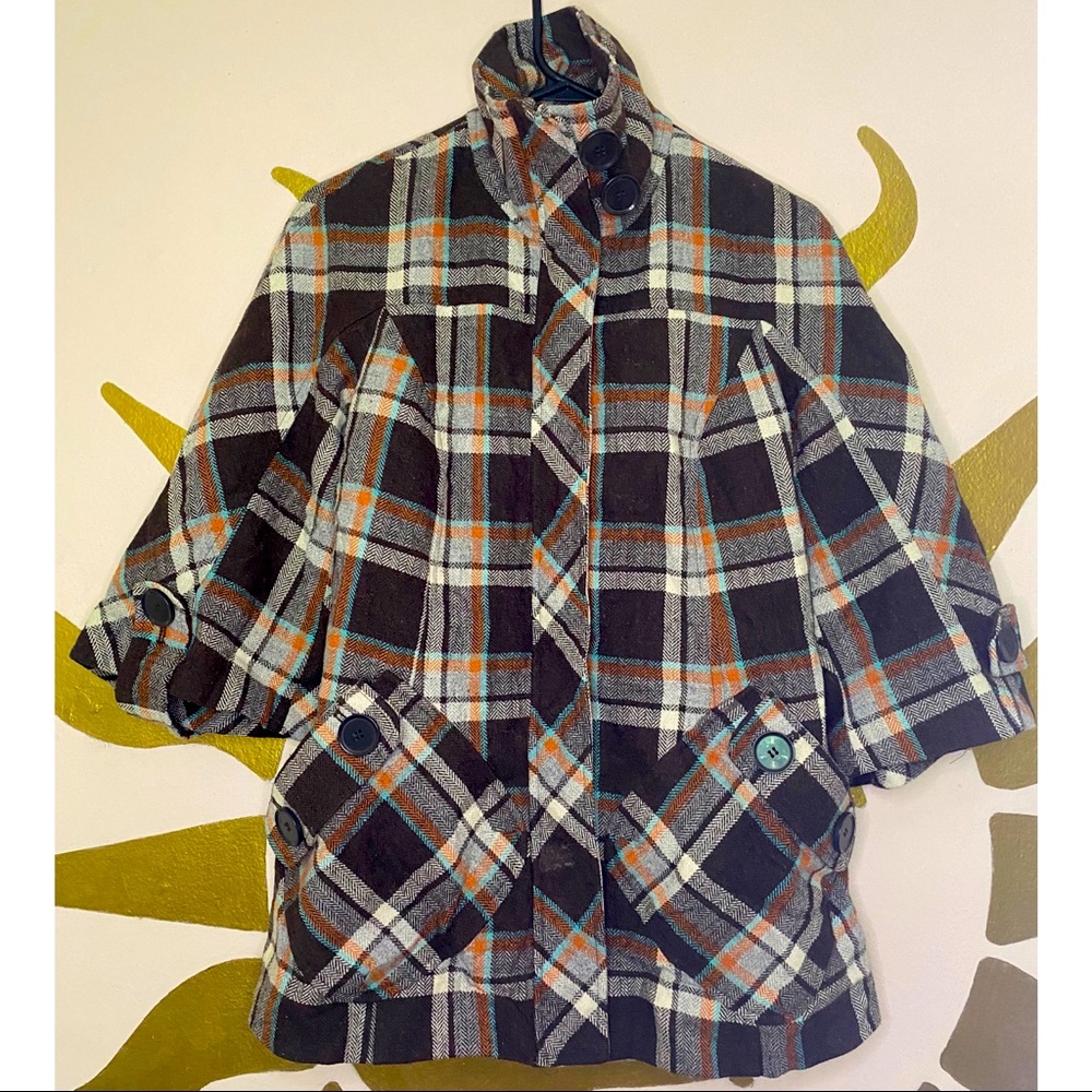 Sherlock Holmes-esque cropped sleeve pea coat.